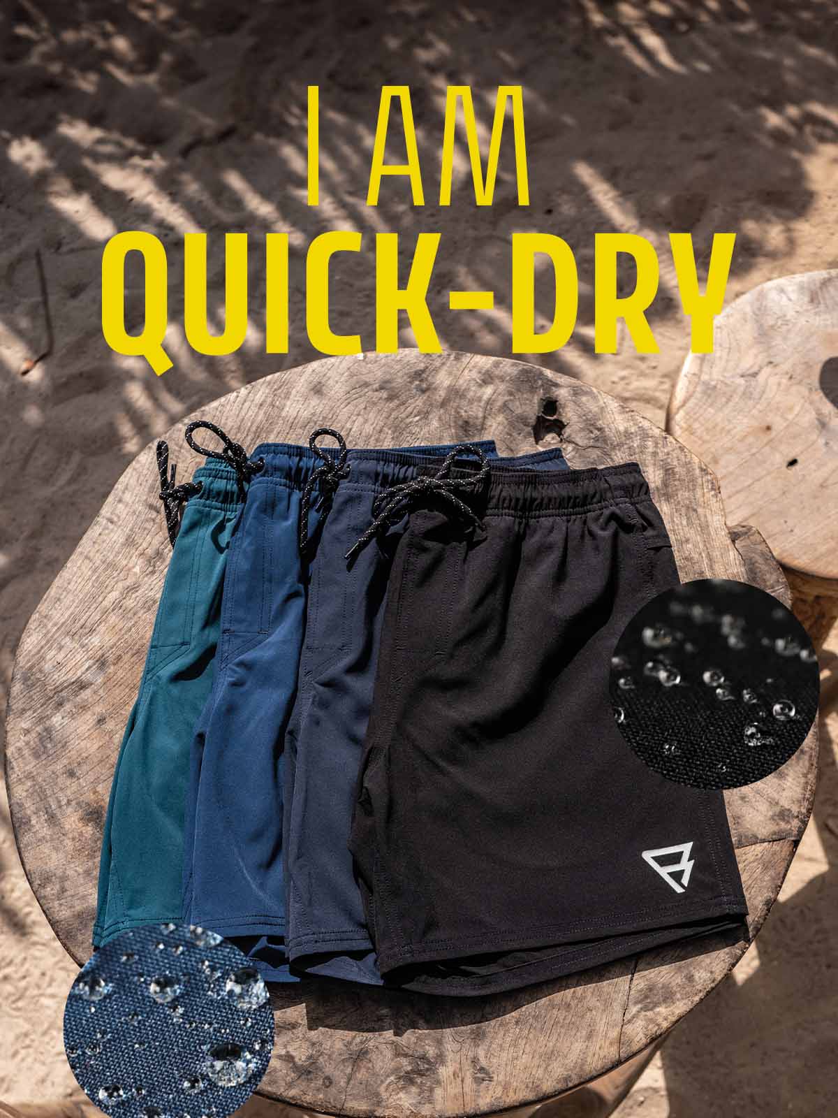 An arrange of Brunotti's Bru-conic Swim Shorts in Blue, Navy, Fuel Green and Black with water drops laying on the fabric showcasing it's Quick Dry feature